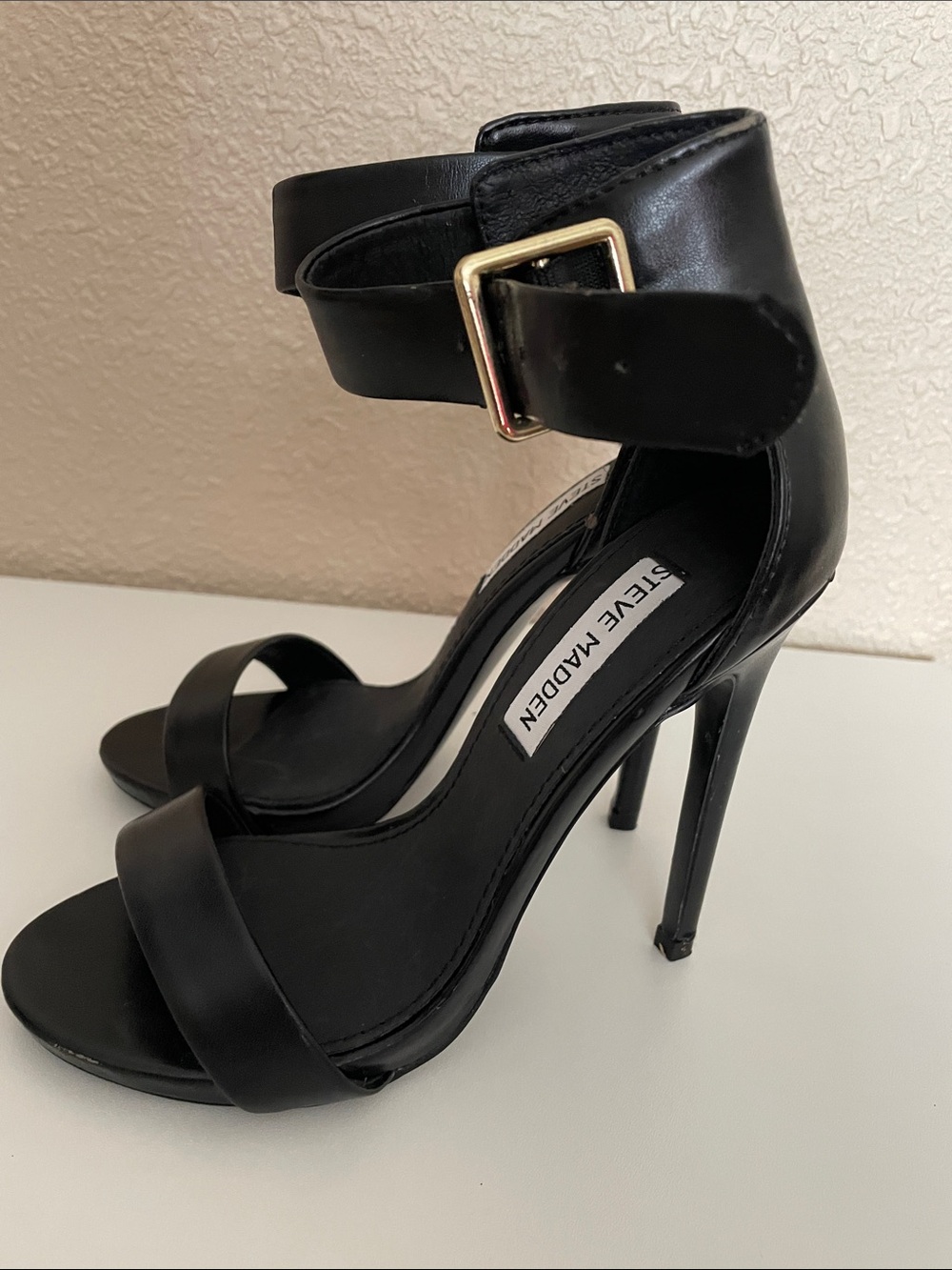 Steve Madden Black Ankle Strap Stiletto Heels with Gold Buckle